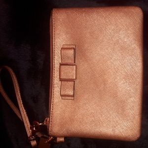 Golden coach wristlet